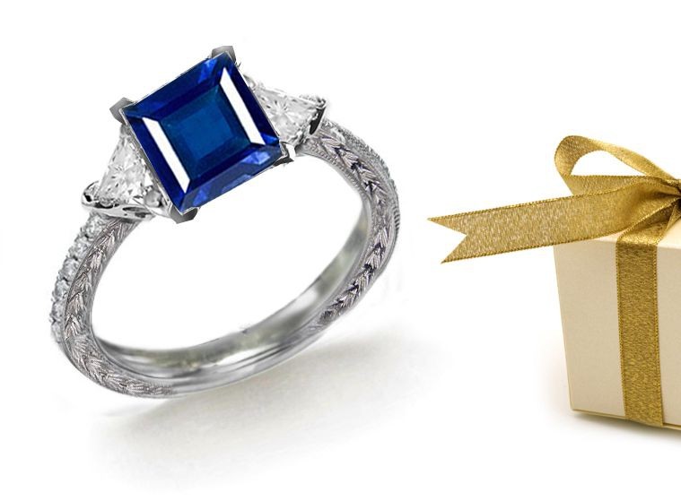 Trillion Diamond & Square Sapphire 3 Stone Ring Emiting A Soft Velvety Light Sheen