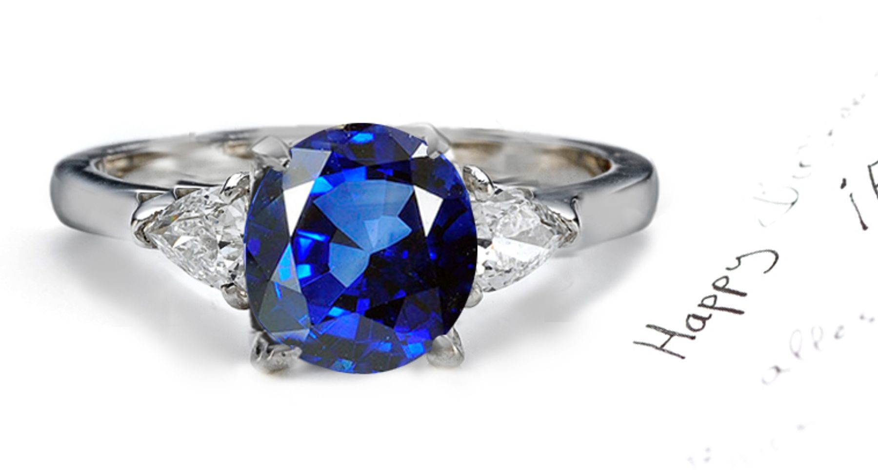 Harmony: A Simply Amazing Round Blue Sapphire & Pears Diamond Ring.