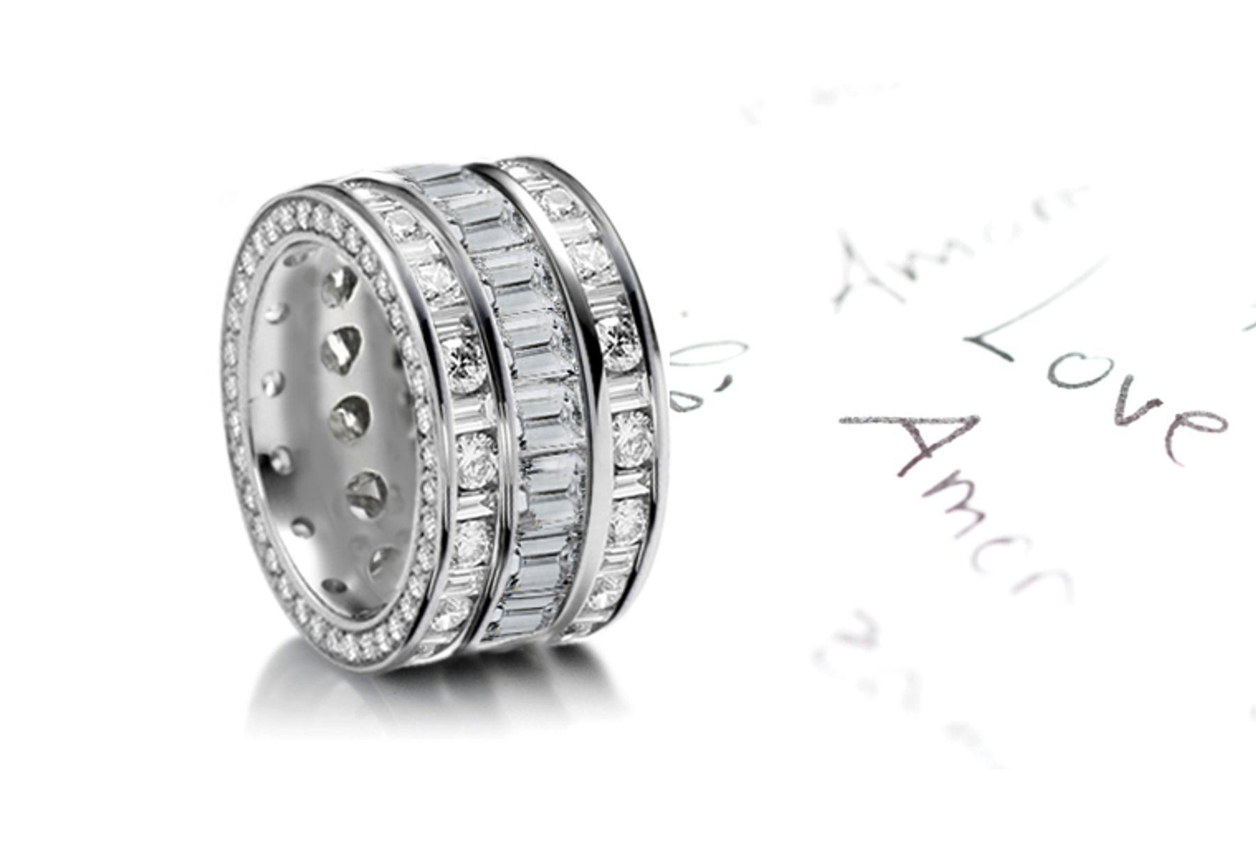Custom Designed Sparkler of Baguette Diamonds set end-to-end bordered by row of mixed diamonds & Sprinkled Diamond Sides