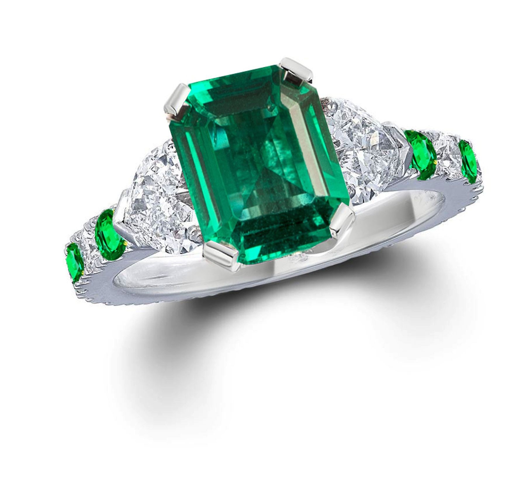 Three Stone Rings With Center Emerald & Further Diamond Accents on Sides