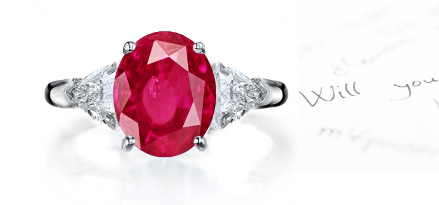 Classic Ruby Ring: Platinum ruby oval and diamond trillions three stone engagement ring