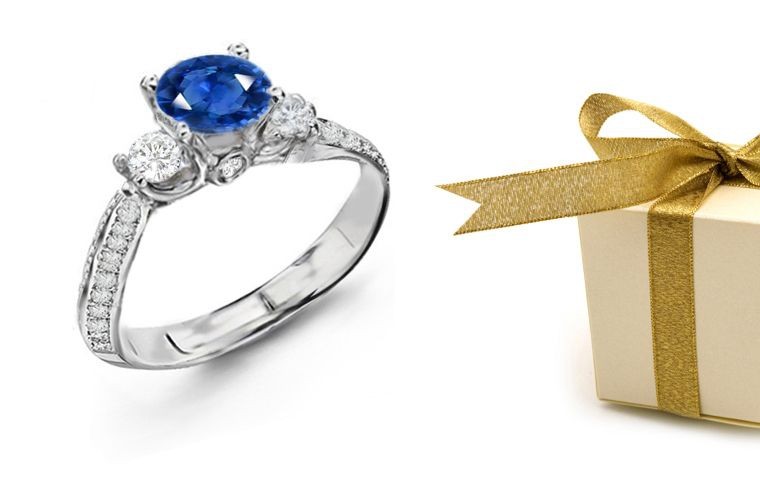 Blue Stone Par Excellence: Round Sapphire Round Diamond Anniversary Gemstone Ring