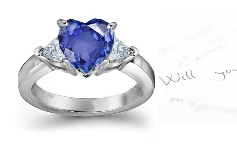Rich Blue Hues: Bridegrooms Signature 3 Stone Pear Shaped Diamond & Heart Fine Deep Blue Sapphire Ring in Platinum & 14k Gold 2 mm thick Cost $3500