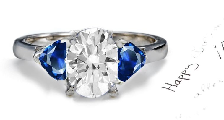 Lucian Magical Stories: This is a Signature 3 Stone Oval Fine Blue Sapphire & Heart Diamond Ring in Platinum & White Gold Cost $3200