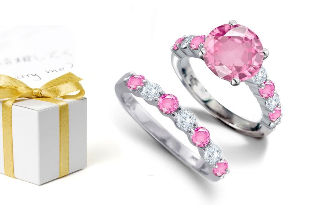 Luminous Deep Pink Stones: Sapphire atop Round Deep Pink Sapphires & Diamonds & Engagement Ring & A Sapphire Diamond Band