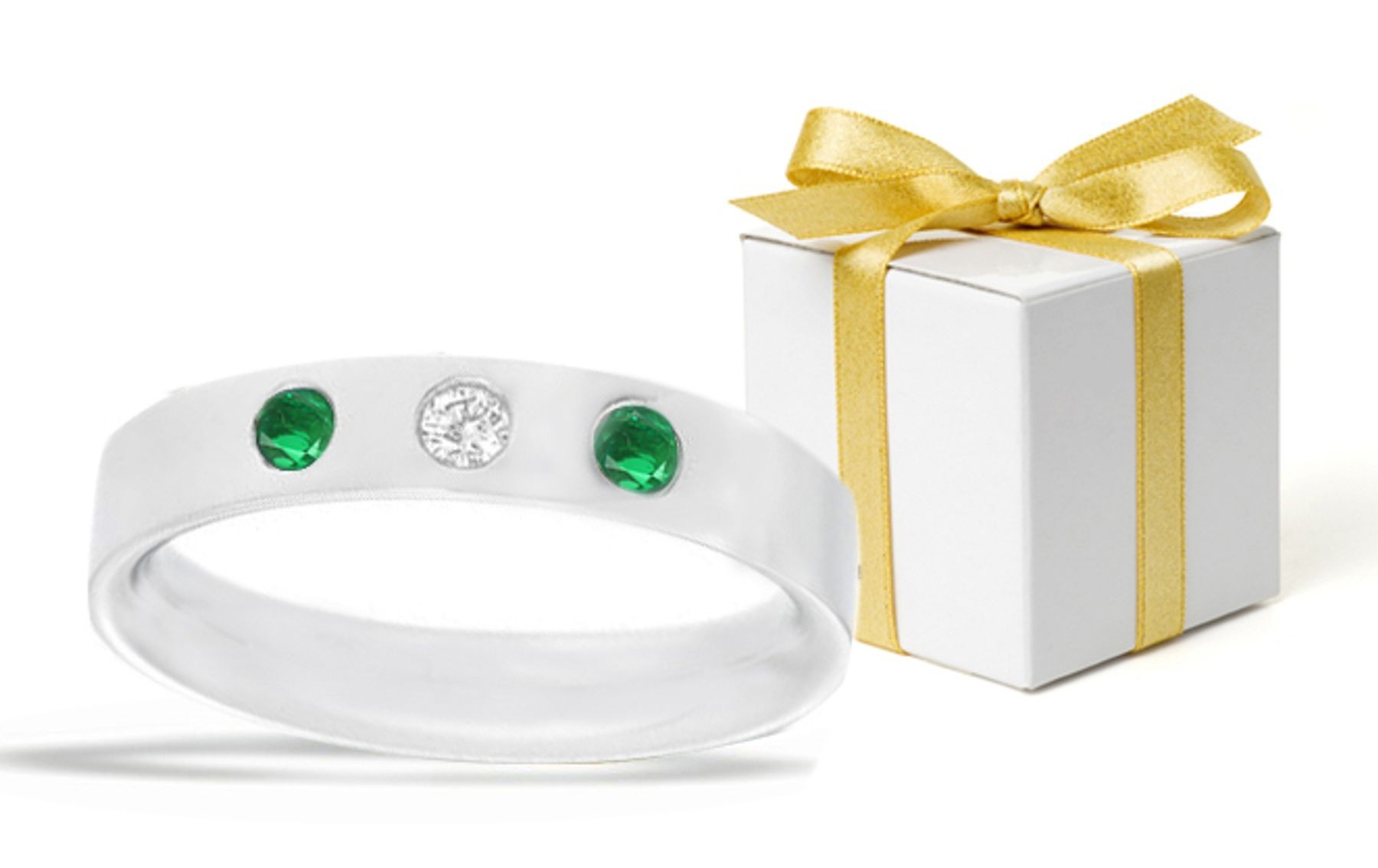 Emerald Rings: Classic Tiffany Style Emerald and Diamond Rounds Tiffany Style Burnish Set Rings in Platinum. 