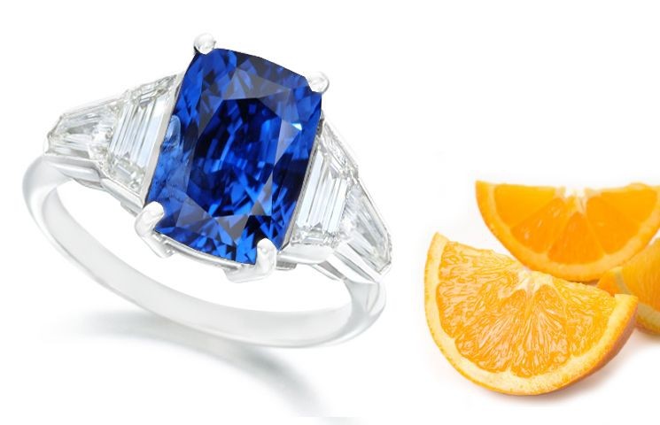 Cushion Blue Sapphire Three Stone Ring with Trapezoid Diamonds in 14k White Gold (7x5 mm)