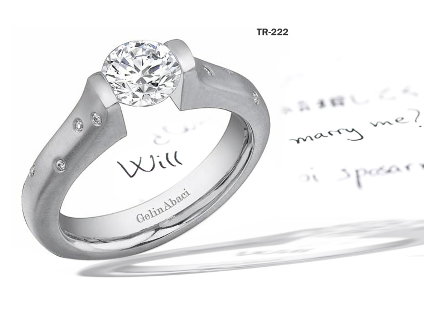 Modern Settings: Tension Set Diamond Solitaire Ring Diamond Accents