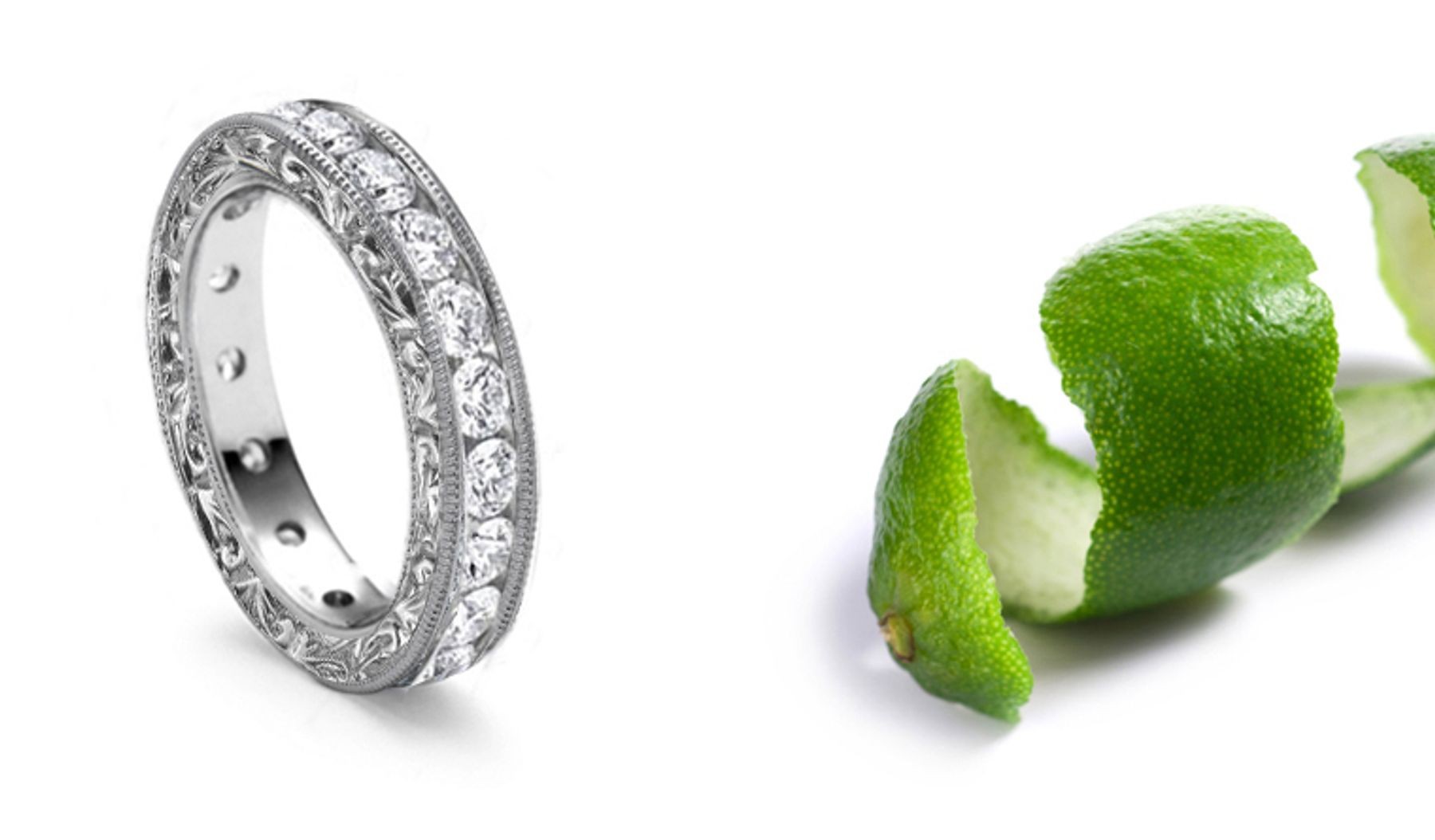 From Renaissance Court: Diamond Ring Seamlessly-Set, Perfectly-Matched, Round Cut Diamonds and Engraved Metal Sides