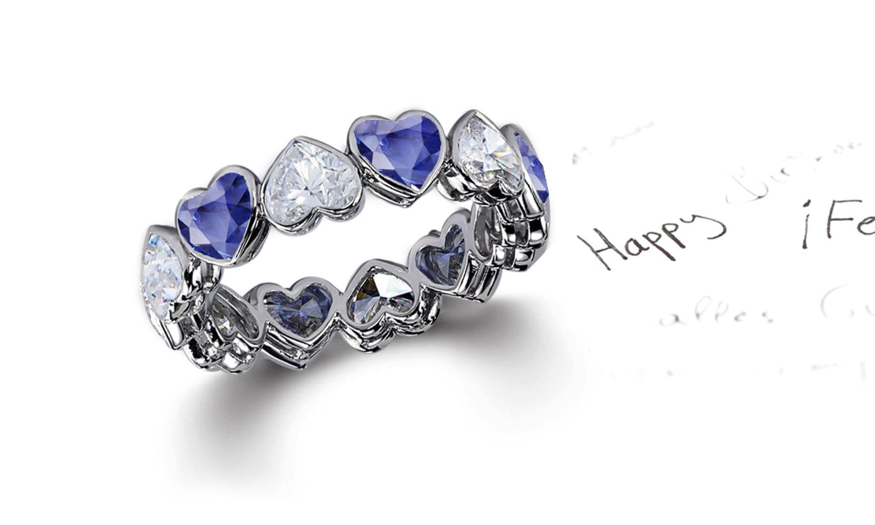 Delicate Heart Shaped Diamond Bezel Set Blue Sapphire & Diamond Eternity Rings