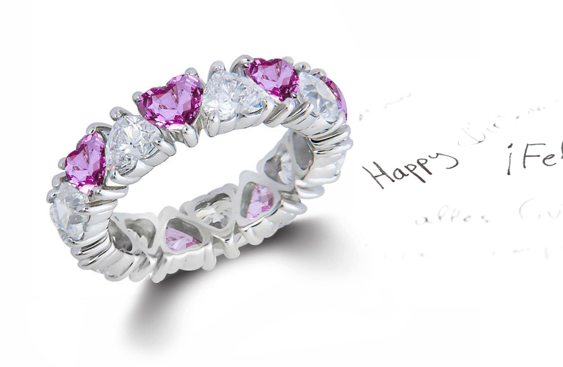 Heart Shaped Diamond Prong Set Diamond & Pink Sapphire Eternity Rings in Gold