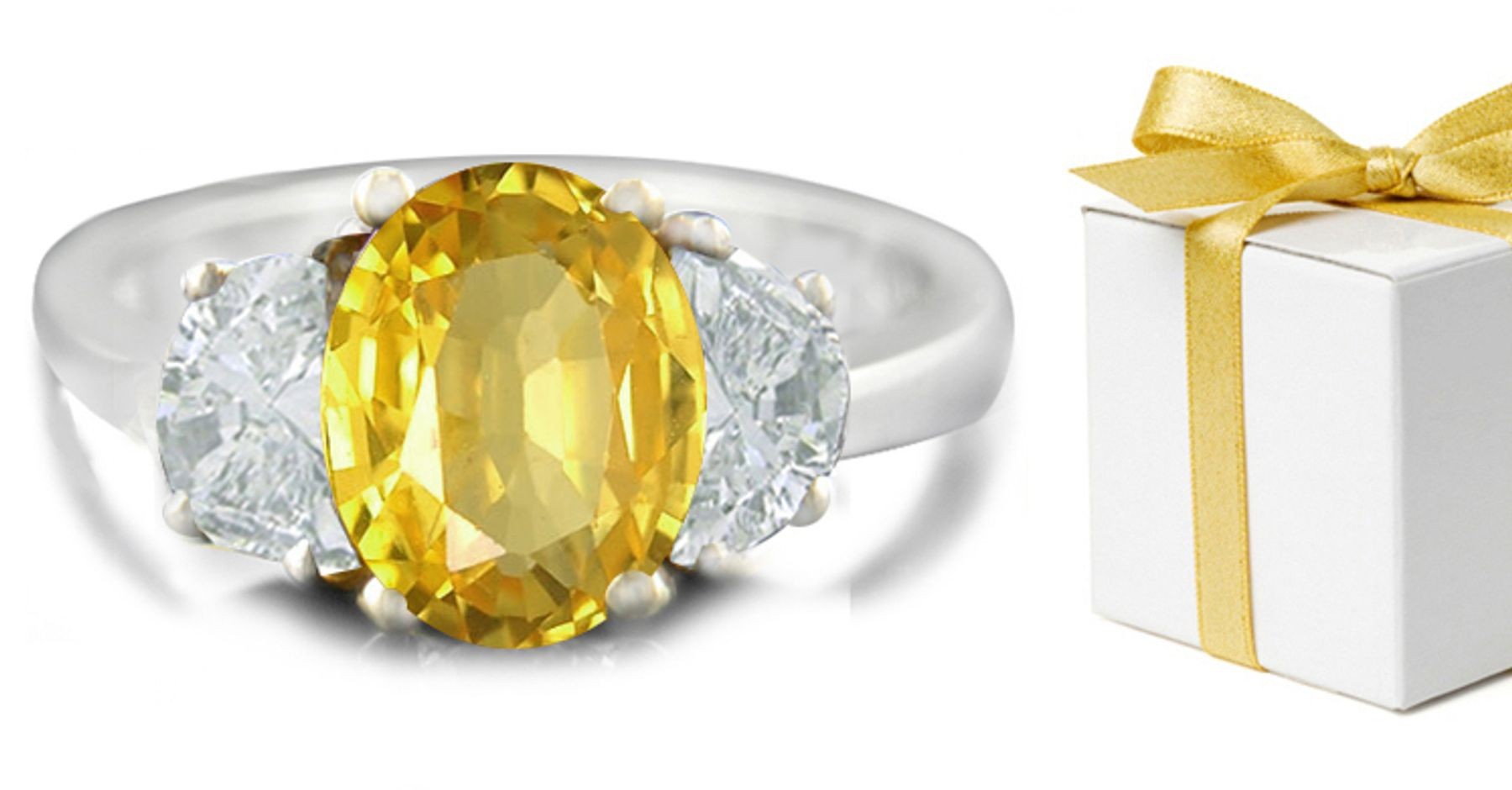 Oval Yellow Sapphire with Trapezoid Diamonds in 14k White Gold Engagement Ring (7x5 mm)