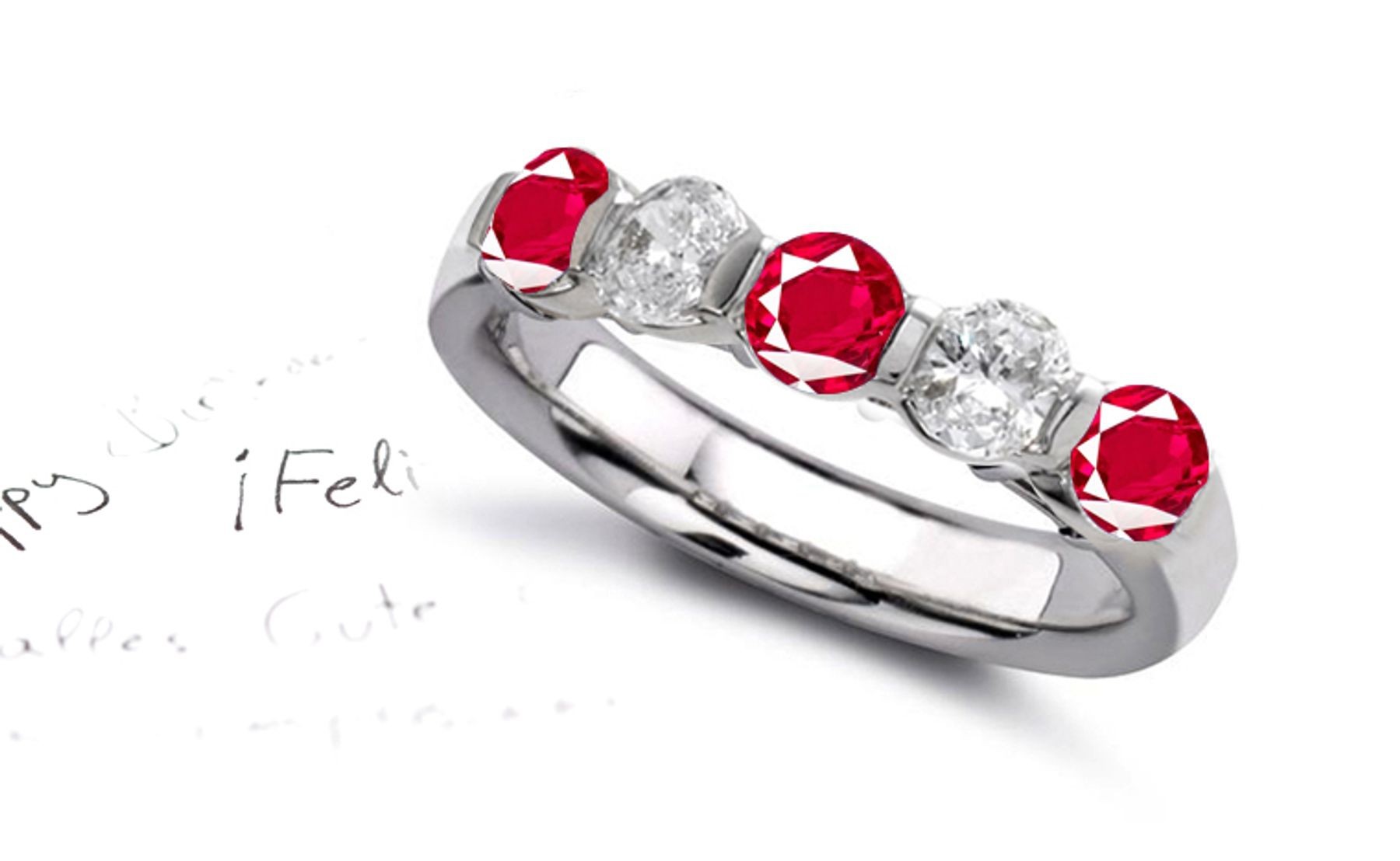 Ruby Five Stone Rings: Ruby diamond ring in platinum set with three round rubies and two rounddiamonds