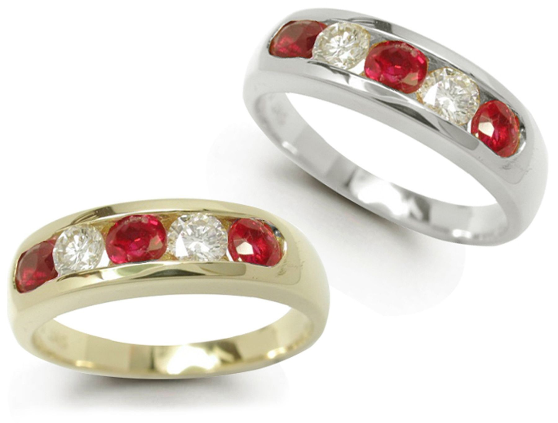 Five Stone Ruby Ring: Ruby diamond ring in platinum set with three round rubies and two round diamonds.