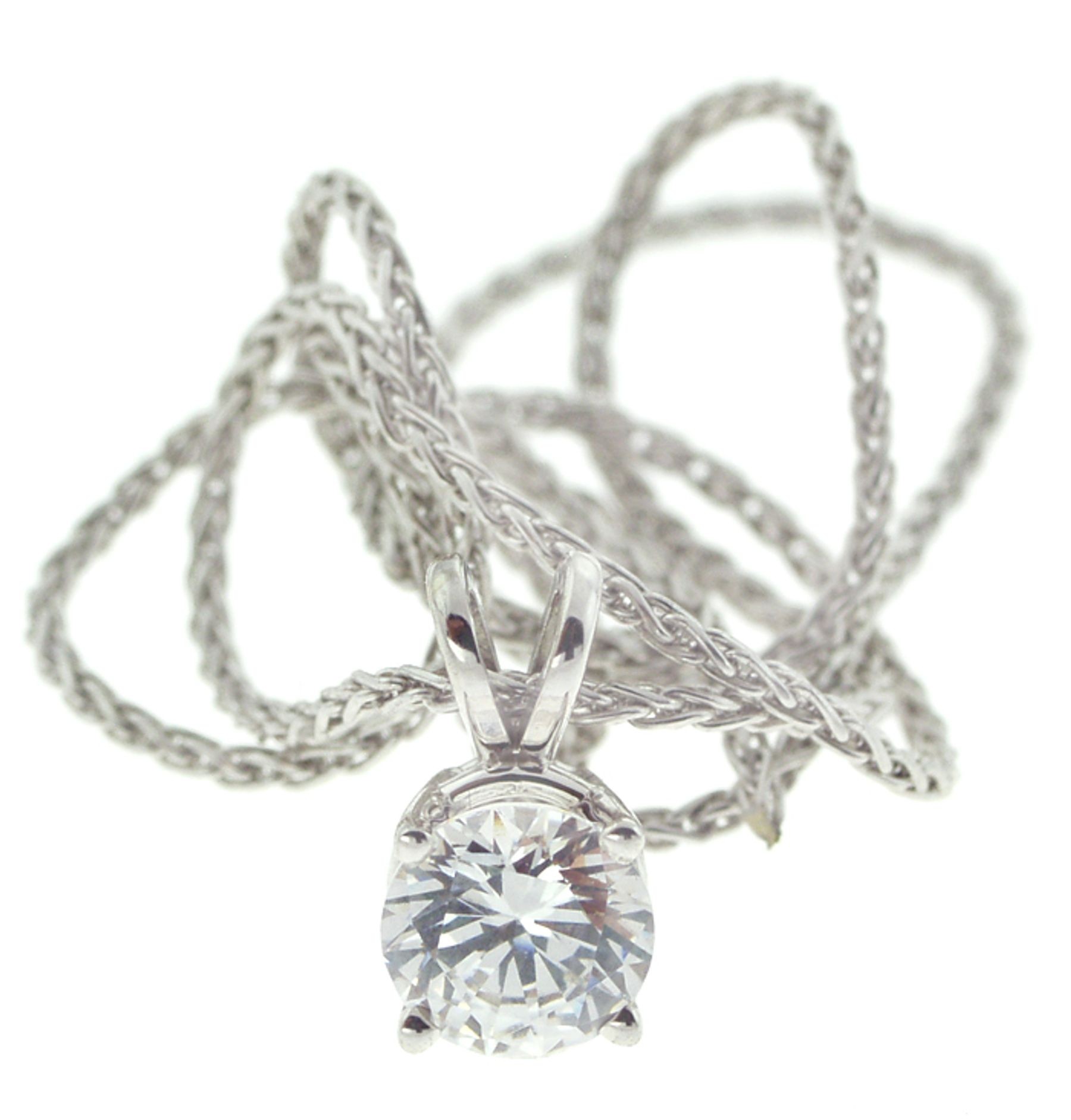 Platinum diamond pendant. Bezel set round diamond pendant with chain