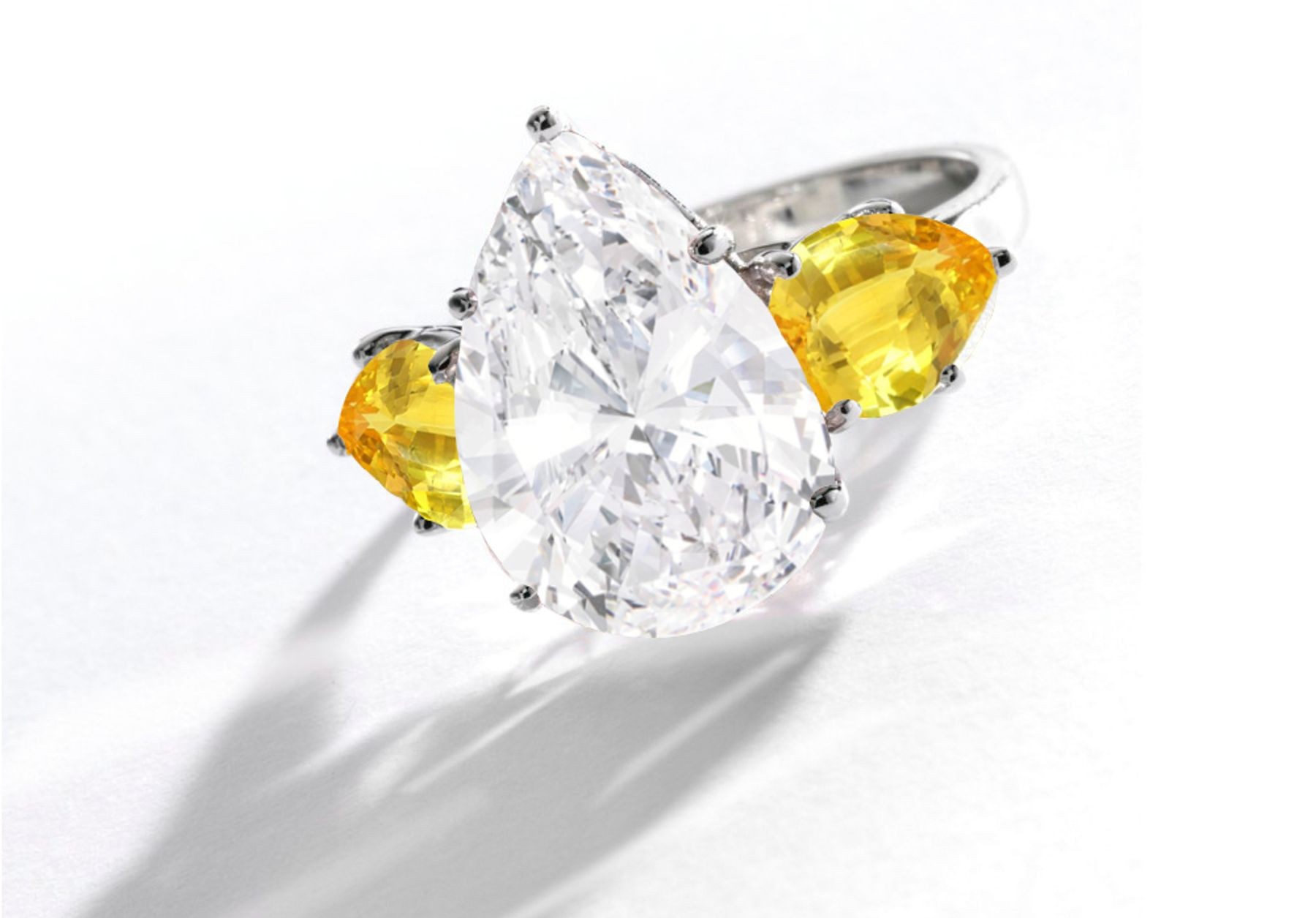 Pear-Shaped Diamond & Yellow Sapphire Three Stone Engagement and Right Hand Rings
