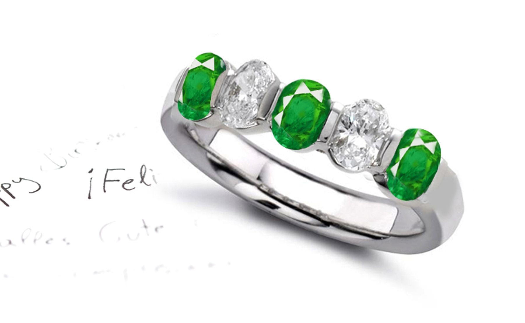 Design & Style: Five Stone Oval Diamond Emerald Anniversary Ring