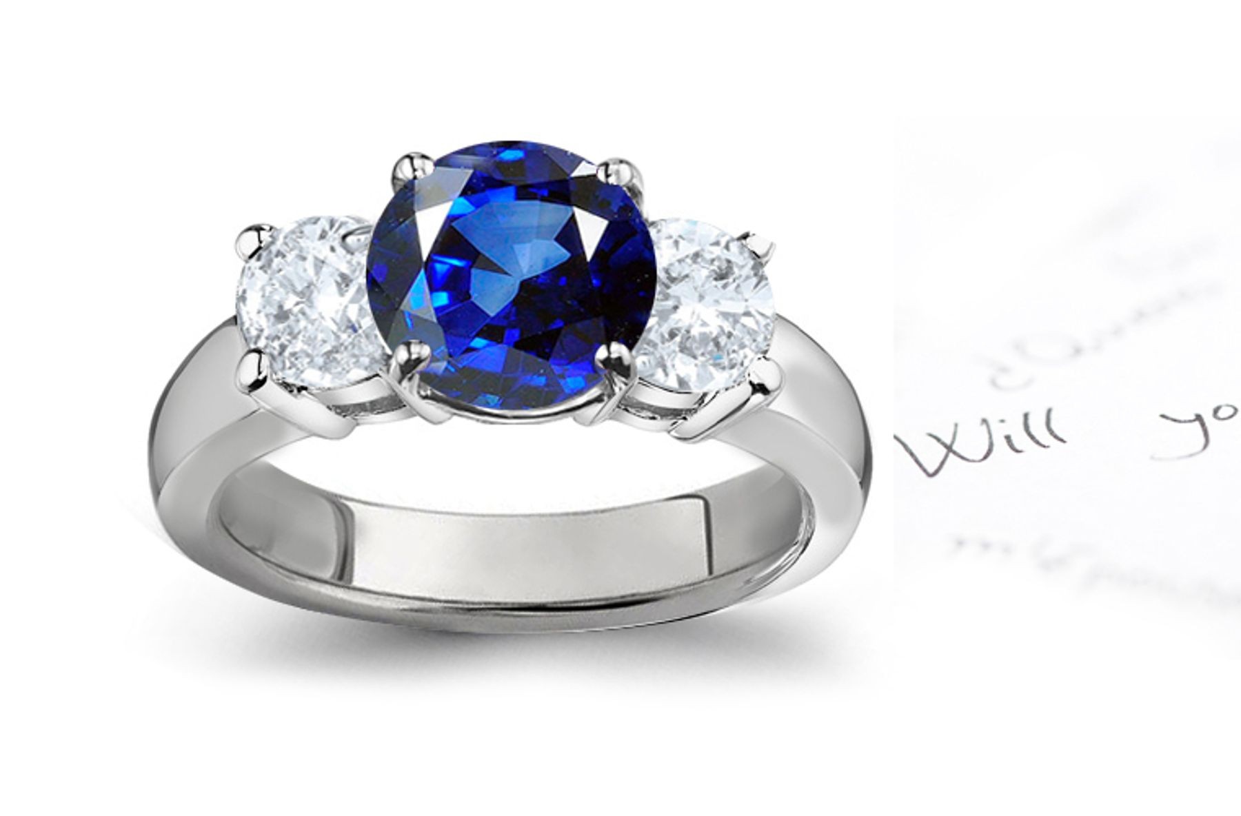 Burma Blue Sapphire Diamond Engagement Rings: Platinum ring with Round Diamonds and Round Sapphire.