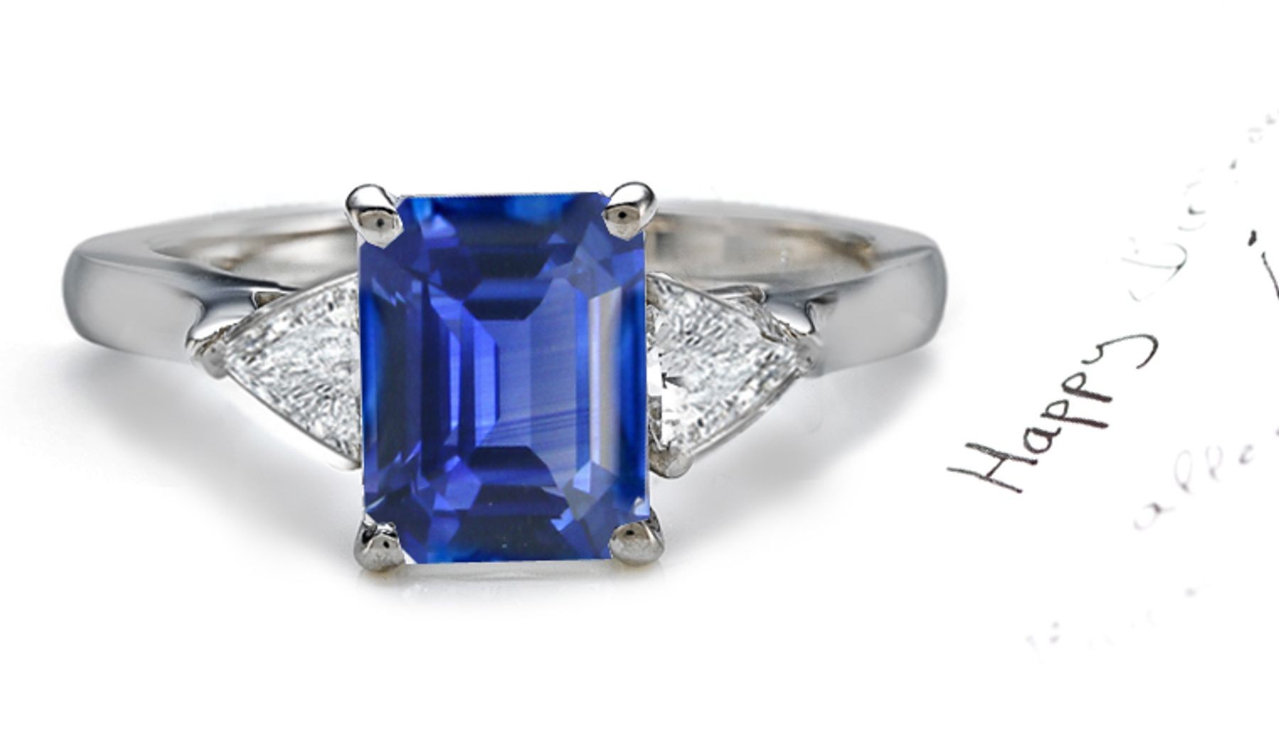 Rich Blue Sapphire Diamond Engagement Rings: Platinum Sapphire Octagon and Trillion Diamonds.