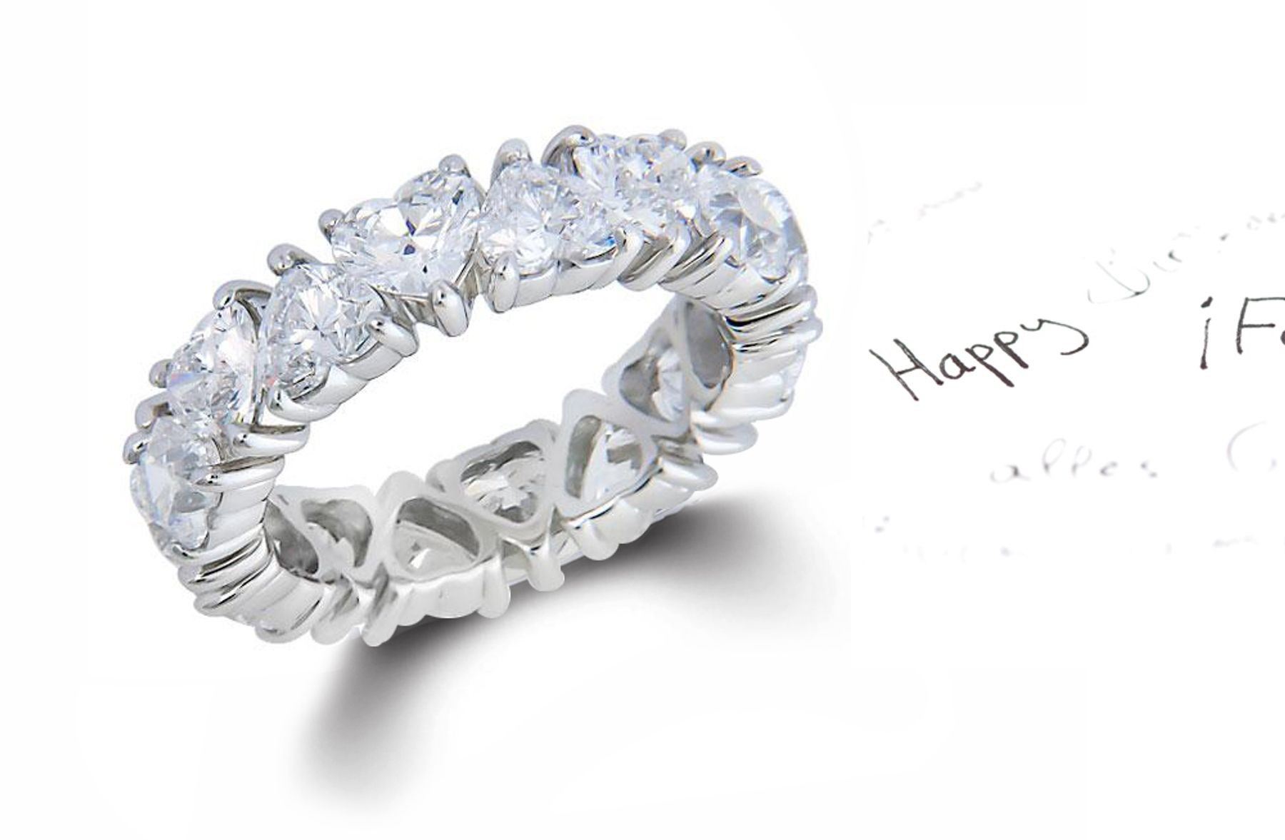Heart Shaped Diamond Prong Set Diamond Eternity Rings in Gold or Platinum