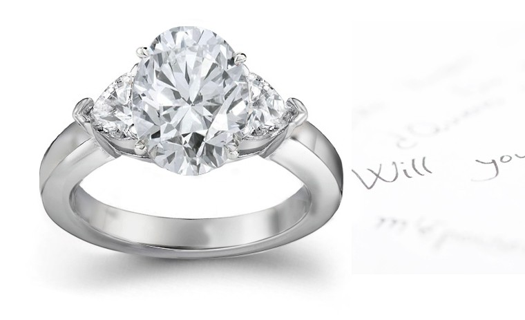 Three Stone Oval Diamond & Side Heart Diamonds Three Stone Anniversary Ring