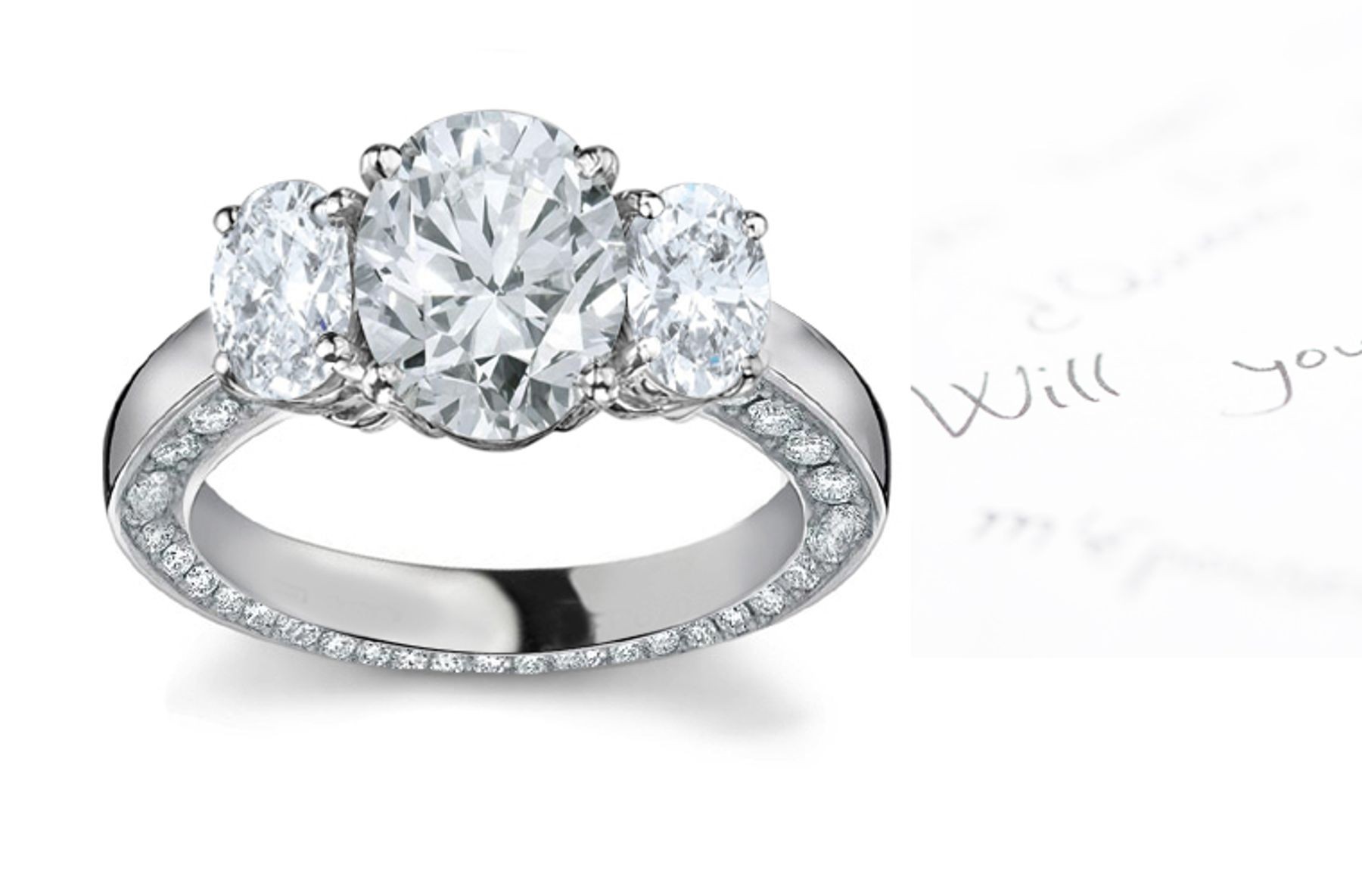 Center Oval & Side Oval Diamonds Three Stone Ring