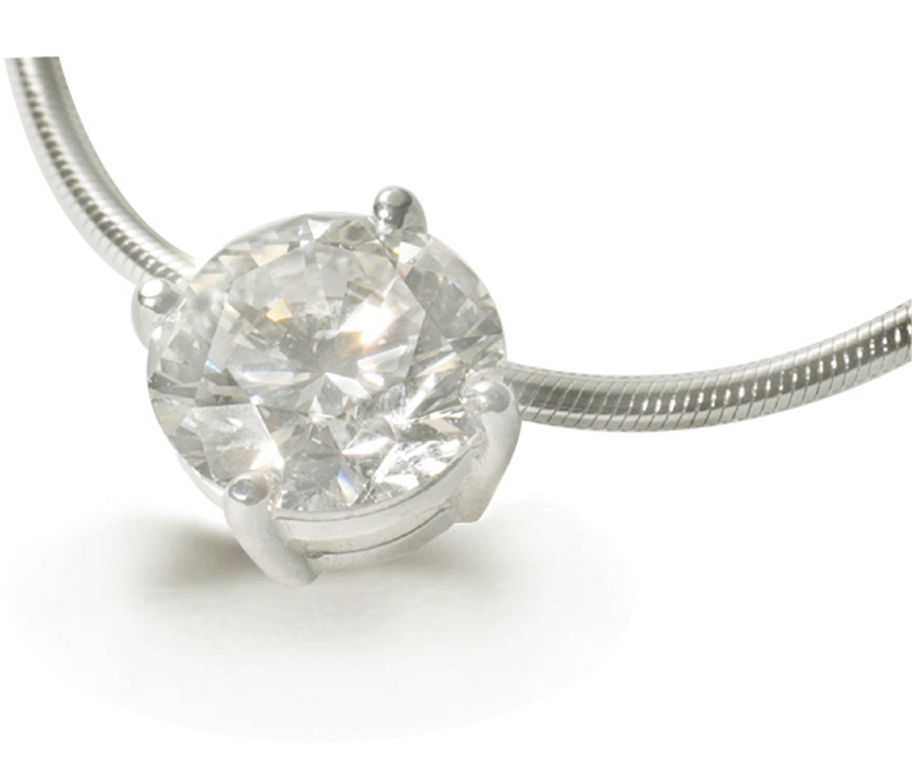 Platinum diamond pendant. Bezel set round diamond solitaire pendant with chain