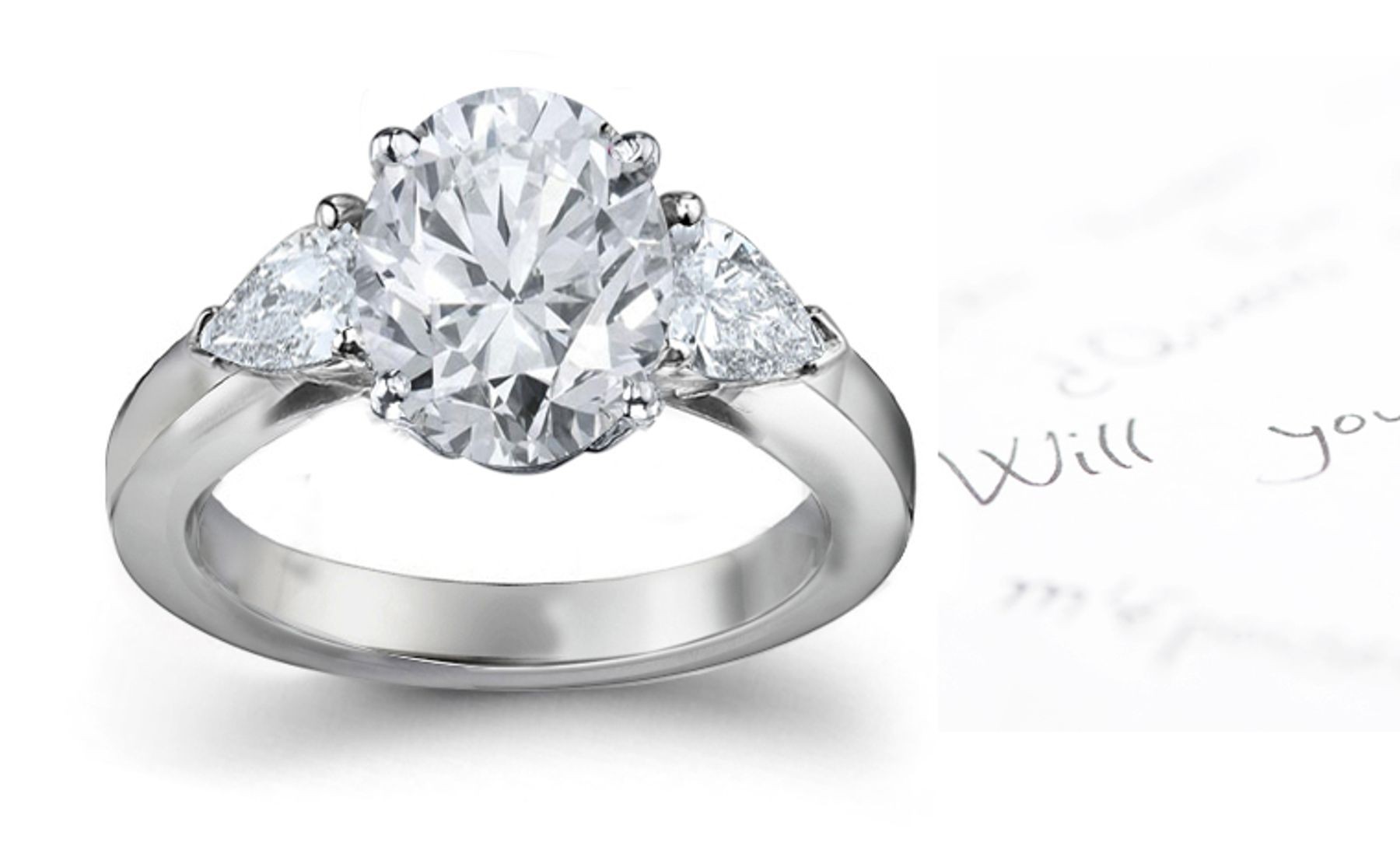 Center Oval & Side Pears Diamonds Three Stone Ring