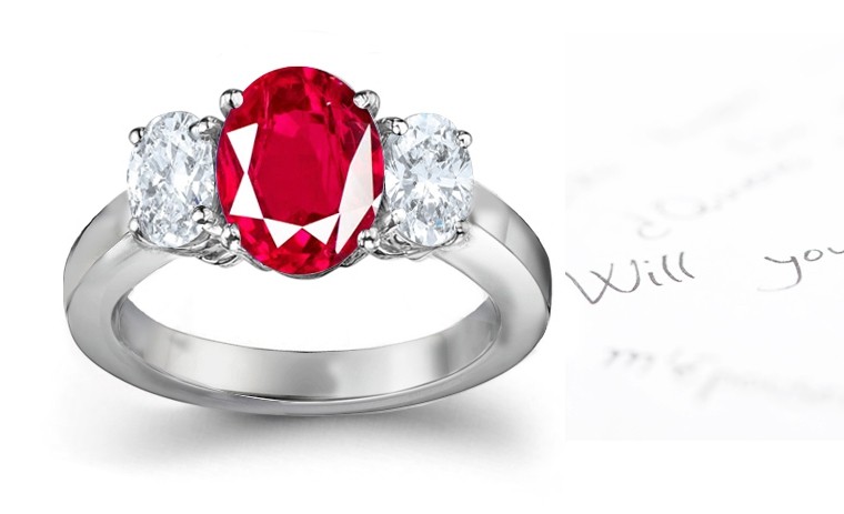 Three Stone Ruby and Diamond Ring: Three Stone (Three Oval Ruby and Diamonds) Rings in Platinum. 
