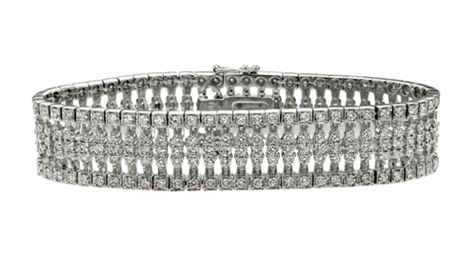 View Open Filigree Antiue Style Diamond Bracelet.