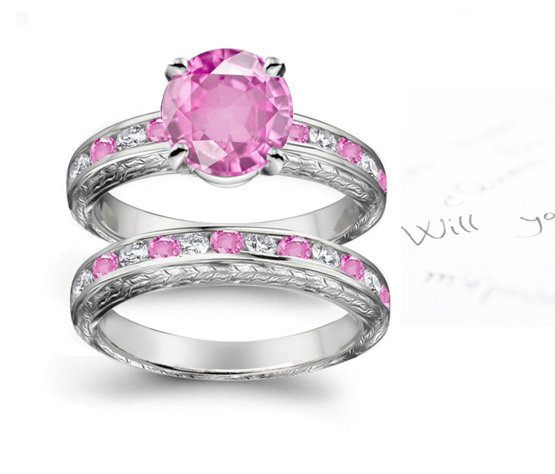 A timeless, design with a deep pink 1.0 carat Splendid Sapphire & halo of well-cut White Diamonds Splendid Sapphires