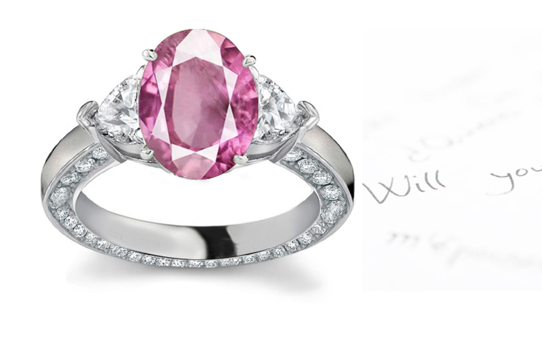 3 Stone Oval Pink Sapphire & Heart Diamond Ring in Platinum & White gold