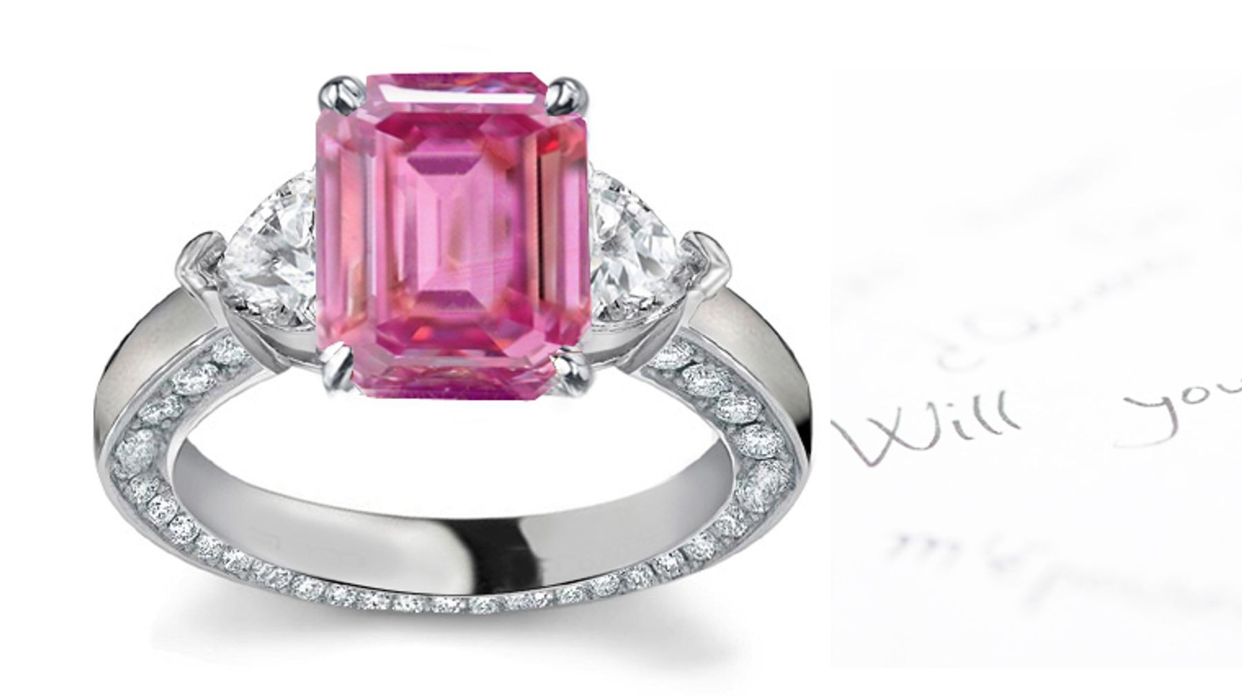 3 Stone Emerald Cut Pink Sapphire & Heart Diamond Ring in Platinum & White gold