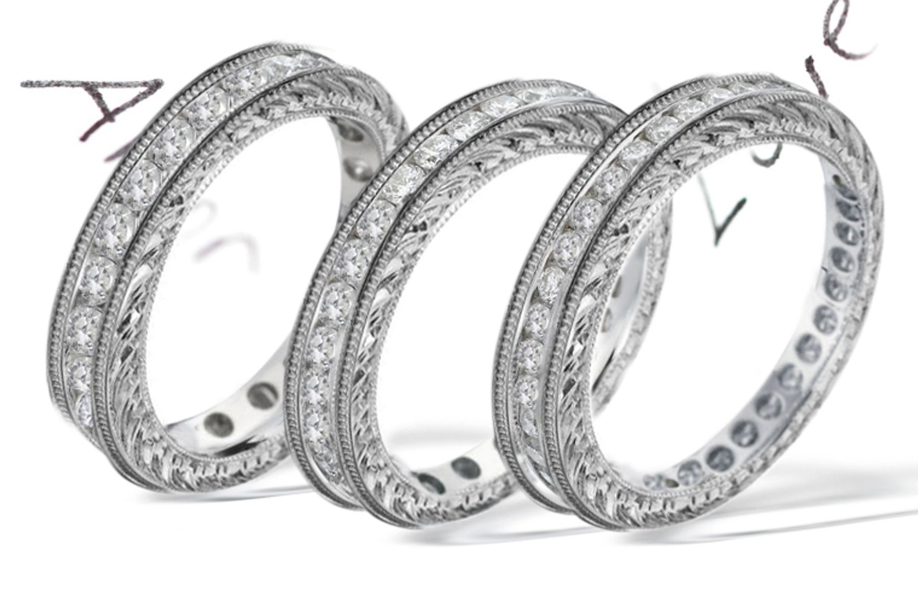 Platinum Channel Prong Set Round Diamonds Rings