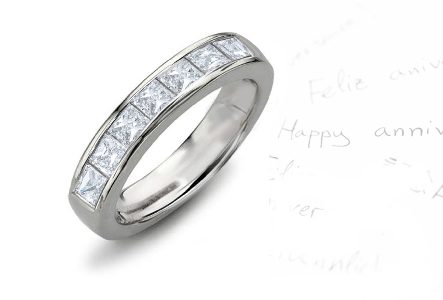 Seven Stone Diamond Ring: Platinum Princess Cut Diamond Seven Stone Channel Set Diamond Anniversary Ring.