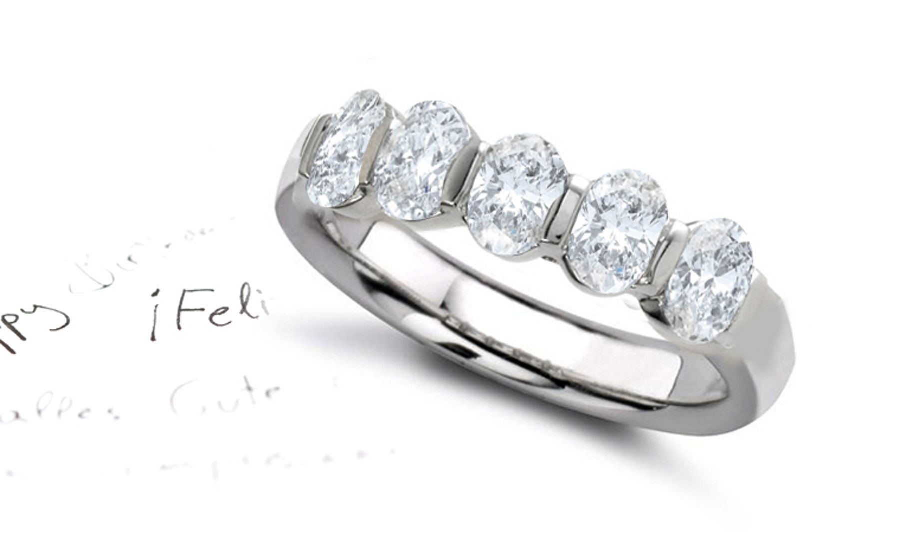 Platinum Prong Set Oval Diamond Half Eternity Ring.