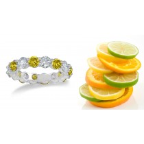 Platinum Yellow Colored Diamond Common-Prong Eternity Rings