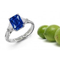 Richard Preston's Collection: 3 Stone Round Diamond Emerald Cut Sapphire Ring