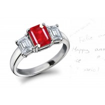 Ruby Diamond Three Stone Engagement Ring: Platinum ring with center ruby octagon and octagon diamonds.