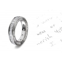 Evoking A Dazzling Star: Twinkling Asscher Cut Diamonds are Channel Set with Scribed Motifs on Anniversary Band Sides