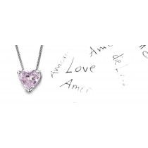 Pink Colored Diamond Pendant. Prong set heart pink diamond solitaire pendant with chain