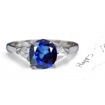 Harmony: A Simply Amazing Round Blue Sapphire & Pears Diamond Ring.