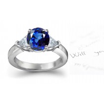 Harmony: A Fine Vivid Royal Blue & Trillion Diamond 3-Stone Ring.