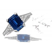 Pave Set Diamond Shank Blue Sapphire Emerald Cut Sapphire Ring in Flame Color Gold