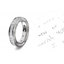 Captivating People's Hearts: Sparkling Asscher Cut Diamonds are Channel Set with Projected Motifs on Anniversary Band Sides