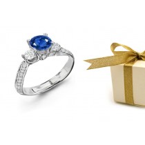 Blue Stone Par Excellence: Round Sapphire Round Diamond Anniversary Gemstone Ring