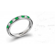 A Pretty Legend: 10 Stone Emerald & Diamond Anniversary Band