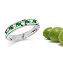 A Perfect Love Story: 11 Stone Emerald & Diamond Band in Gold