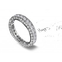 Celebrate: Channel Set Diamond Band Bordered by Precision Set Bead Set Diamonds in Platinum