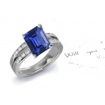 Intrinsic Value: A Perfect Split Shank Emerald Cut Fine Blue Sapphire & Round Signifying Diamond Fashion Ring in Gold